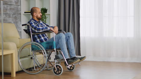 Unhappy-man-in-wheelchair