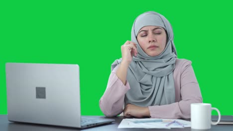 Smart-Muslim-businesswoman-thinking-about-something-Green-screen