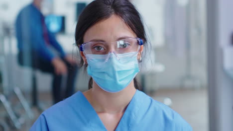 Close-up-of-tired-nurse-with-protection-mask