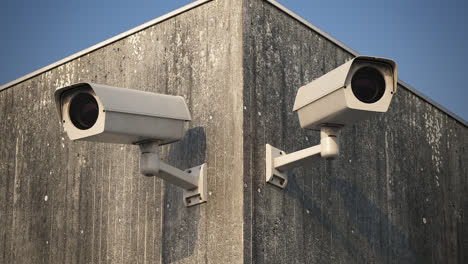 Security-cameras-on-the-cloudy-sky.-Seamless-animation-with-protection-equipment-system.-White,-digital-guards-monitoring-the-private-property,-observe-the-view-and-record-video.