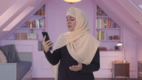 Angry-Muslim-woman-talking-on-video-call