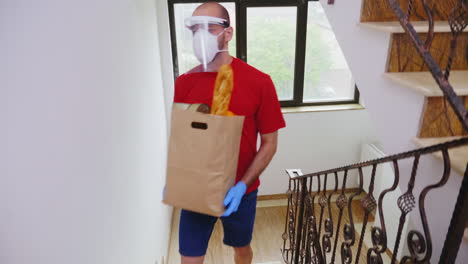Food-courier-wearing-mask-and-protection-gloves