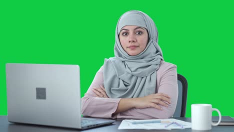 Confident-Muslim-businesswoman-looking-to-the-camera-Green-screen
