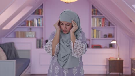 Sick-Muslim-woman-suffering-from-Headache