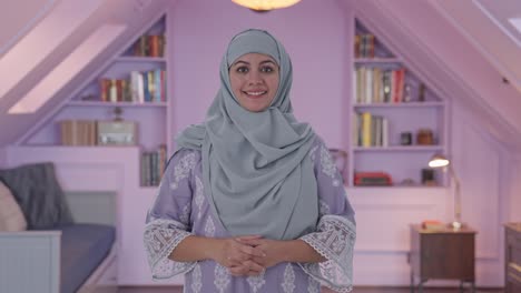 Happy-Muslim-woman-smiling-to-the-camera