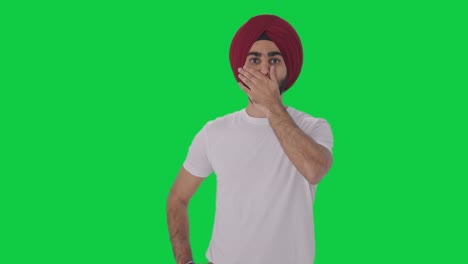 Sikh-Indian-man-sees-a-shocking-news-Green-screen