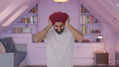 Angry-Sikh-Indian-man-shouting-with-closed-ears