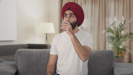 Happy-Indian-Sikh-Indian-man-taking-medicine