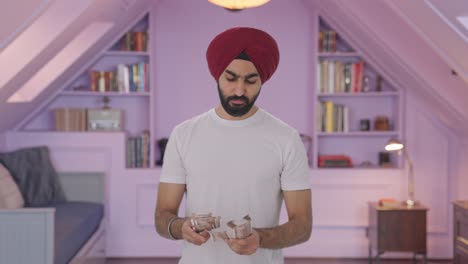 Sikh-Indianer-Zählt-Geld