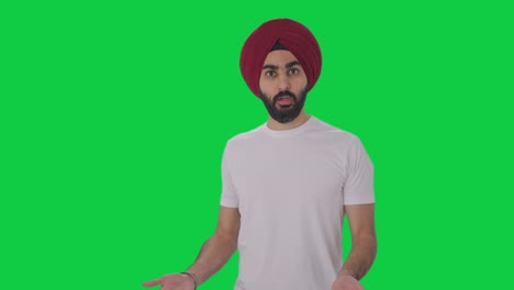 Angry-Sikh-Indian-man-fighting-with-someone-Green-screen