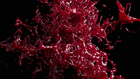 Explosión-De-Líquido-Rojo-Oscuro-En-Animación-3D,-Que-Captura-Una-Salpicadura-Dinámica-Y-De-Alto-Detalle-Sobre-Un-Fondo-Negro-Intenso.
