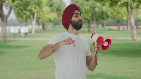 Angry-Sikh-Indian-man-protesting-for-rights-in-park