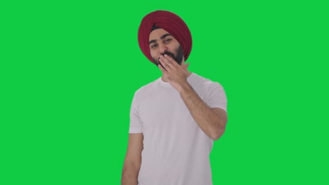 Fröhlicher-Sikh-Indianer,-Der-Fliegende-Küsse-Auf-Grünem-Bildschirm-Gibt
