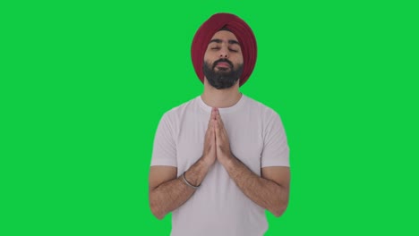 Religious-Sikh-Indian-man-praying-to-God-Green-screen