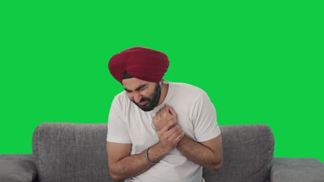 Sikh-Indischer-Mann-Leidet-Unter-Handschmerzen,-Grüner-Bildschirm