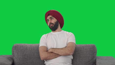 Verärgerter-Sikh-Indianer-Schlägt-Sich-Auf-Den-Kopf,-Grüner-Bildschirm