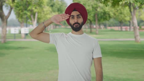 Proud-Sikh-Indian-man-saluting-in-park
