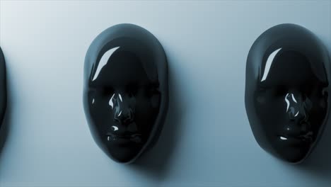 Glossy-black-masks-in-3D-animation,-creating-an-air-of-enigma-with-their-reflective-surface-against-a-cool-blue-background