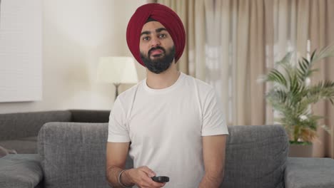 Angry-Sikh-Indian-man-Indian-watching-TV