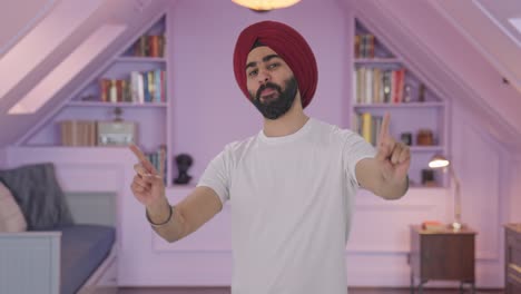 Happy-Sikh-Indian-man-dancing-and-doing-Bhangra