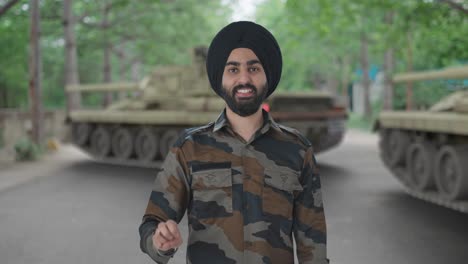Happy-Sikh-Indian-Army-man-showing-victory-sign