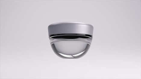 Minimalist-cosmetic-cream-jar-in-3D-animation,-featuring-a-smooth-matte-finish-and-elegant-clear-base-on-a-soft-gradient.