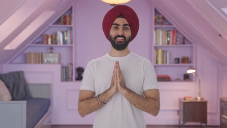 Happy-Sikh-Indian-man-greeting-and-doing-Namaste