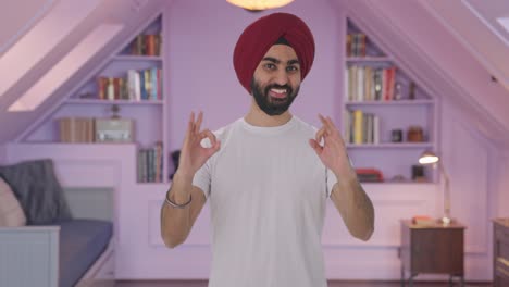Happy-Sikh-Indian-man-showing-okay-sign
