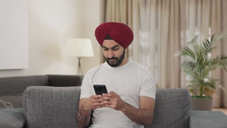Angry-Sikh-Indian-man-chatting-with-someone