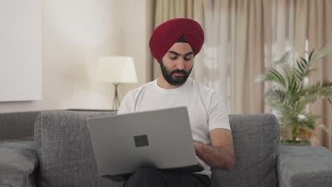 Sikh-Indian-manager-doing-video-call-on-Laptop