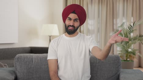 Happy-Sikh-Indian-man-talking-to-the-camera