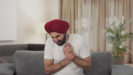 Sikh-Indianer,-Der-Unter-Handschmerzen-Leidet