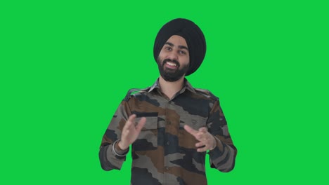 Happy-Sikh-Indian-Army-man-clapping-and-appreciating-Green-screen