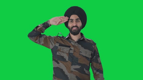 Stolzer-Sikh-Mann-Der-Indischen-Armee-Salutiert-Auf-Grünem-Bildschirm-Mit-Der-Indischen-Flagge