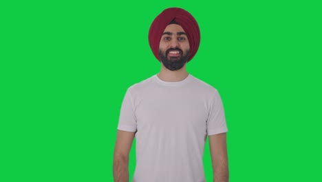 Happy-Sikh-Indian-man-showing-thumbs-up-Green-screen