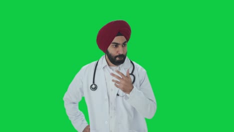 Gestresster-Und-Angespannter-Indischer-Sikh-Arzt,-Grüner-Bildschirm