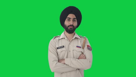 Selbstbewusster-Indischer-Sikh-Polizist-Steht-Auf-Grünem-Bildschirm