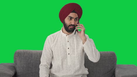 Angry-Sikh-Indian-man-shouting-on-phone-Green-screen