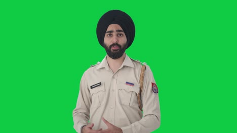 Hombre-De-Policía-Indio-Sikh-Hablando-De-Pantalla-Verde