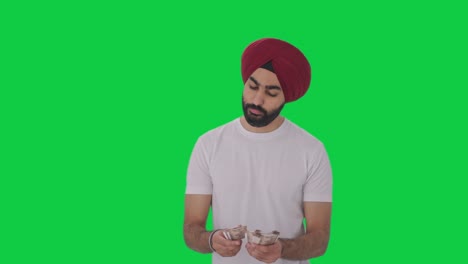 Trauriger-Sikh-Indianer,-Der-Geld-Zählt,-Grüner-Bildschirm