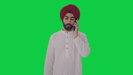 Hombre-Indio-Sij-Hablando-Por-Teléfono-Con-Pantalla-Verde