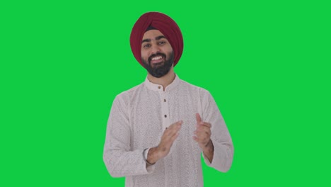 Sikh-Indianer-Klatscht-Und-Schätzt-Den-Grünen-Bildschirm