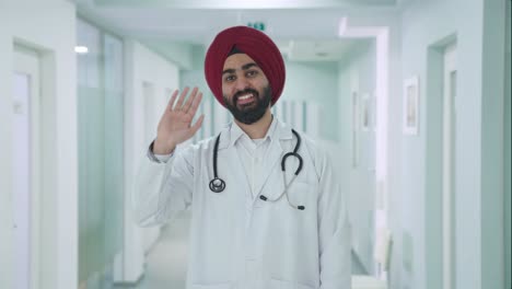 Glücklicher-Indischer-Sikh-Arzt,-Der-Hallo-Sagt