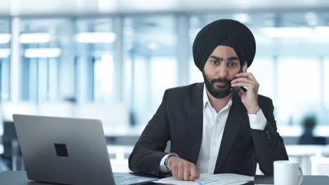 Angry-Sikh-Indian-businessman-shouting-on-call