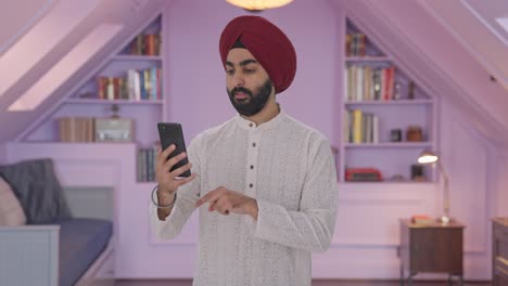 Sikh-Indian-man-talking-on-video-call