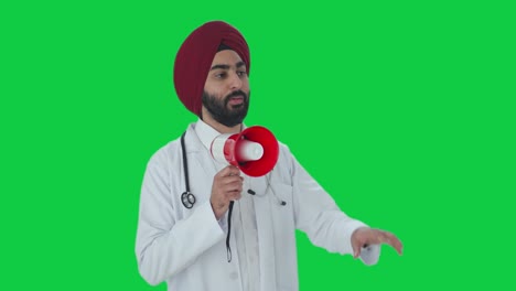 Médico-Indio-Sij-Enojado-Protestando-Contra-La-Pantalla-Verde
