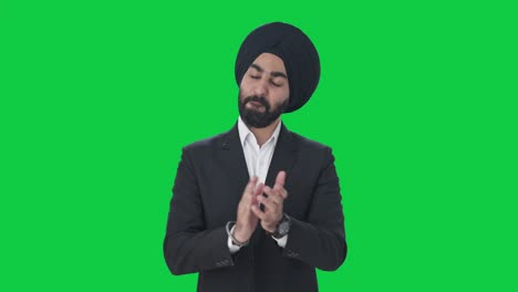 Happy-Sikh-Indian-businessman-clapping-and-appreciating-Green-screen