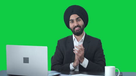 Happy-Sikh-Indian-businessman-clapping-and-appreciating-Green-screen