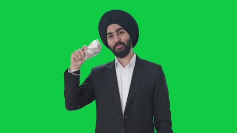 Glücklicher-Indischer-Sikh-Geschäftsmann,-Der-Geld-Als-Fan-Greenscreen-Verwendet