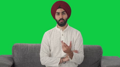 Wütender-Sikh-Indianer,-Der-Verärgert-Auf-Grünem-Bildschirm-Aussieht